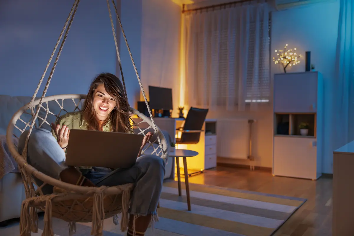A person at home using low-cost internet available to SNAP recipients